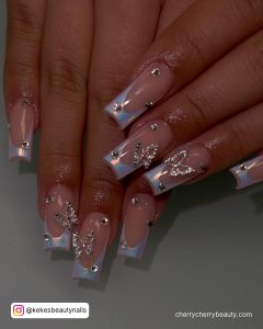 Chrome Light Blue Acrylic Nails With Butterflies