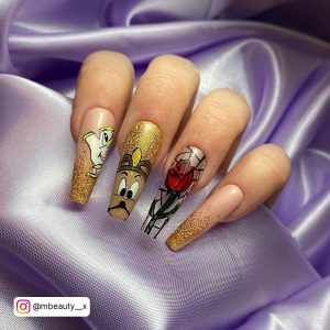 Classy Black And Gold Coffin Nails