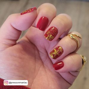 Classy Red And Gold Nails