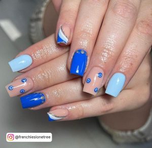 Coffin Light Blue Nail Designs In Different Shades