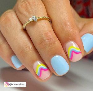 Cute Light Blue Nails With Yellow And Pink Combination