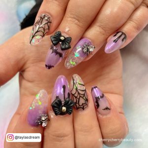 Cute Purple And Black Nails With Embellishments