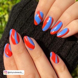 Cute Red And Blue Nails With Marble Design
