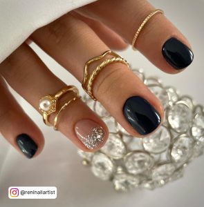 Dark Blue Almond Nails With Glitter
