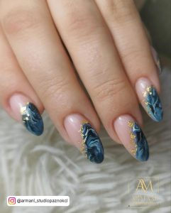 Dark Blue Almond Nails With Golden Touch