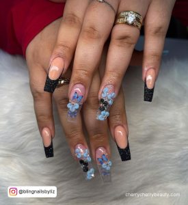Dark Blue And Black Nails With Flowers And Butterflies