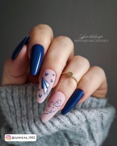 Dark Blue And Pink Nails With Design On Two Fingers