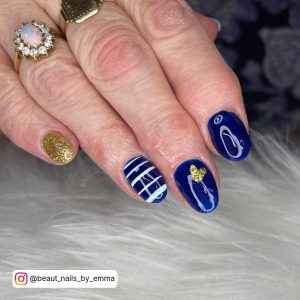 Dark Blue And White Nails With Golden Glitter