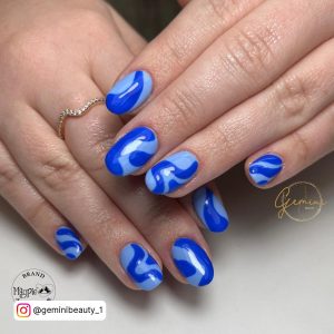 Dark Blue Gel Nails With Marble Effect