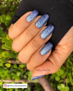 Dark Blue Ombre Nails With Glitter