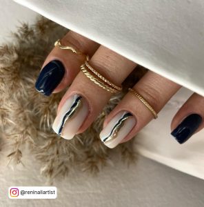Dark Blue Winter Nails With Design On Two Fingers
