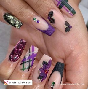 Dark Purple And Black Nail Designs With Embellishments