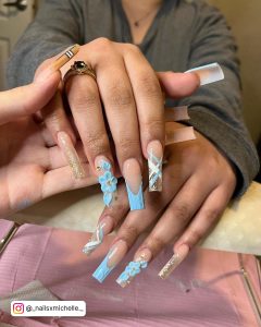 French Tip Sky Blue 1.5 Inch Nails With Flowers