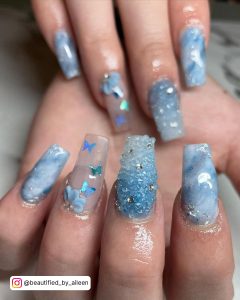 Glitter Royal Blue Coffin Nails With Butterflies And Flowers