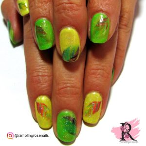 Gold Colr Nails With Yellow And Green