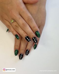 Green And Black Marble Nails With White Dots