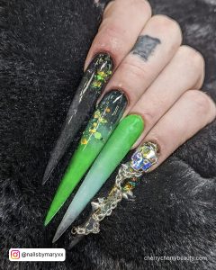 Green And Black Stiletto Nails With Embellishments