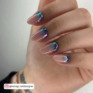 Icy Blue Nails With Glitter
