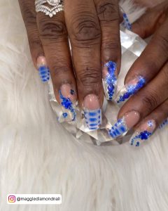 Light Blue Acrylic Nails With Diamonds