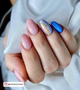 Light Blue And Pink Nails With Gold