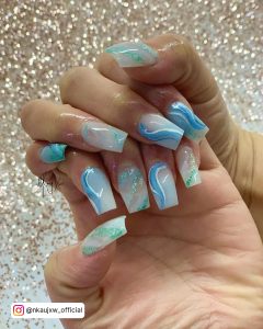 Light Blue Coffin Nails Designs With Swirls