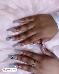 Light Blue French Nails With Embellishments