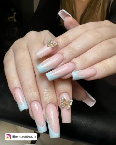 Light Blue Nails French Tip With Butterfly Embellishments