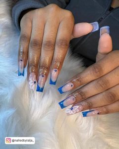 Light Blue Nails With White French Tip