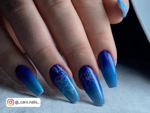 Light Blue Ombre Nails With Flowers