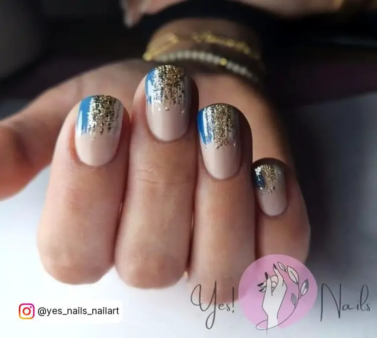 Light Blue White And Gold Nails