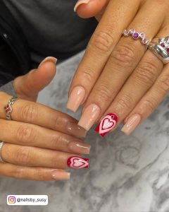 Light Pink Nails With Red Hearts