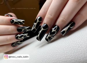 Long Black Square Nails With Silver Design
