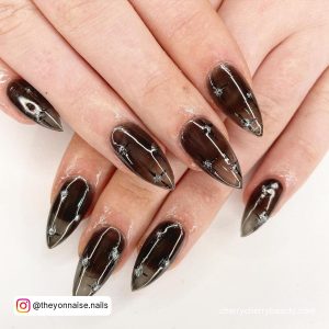 Long Black Stiletto Nails With Clear Reflection
