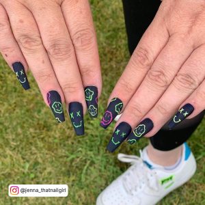 Matte Black And Neon Green Nails In Coffin Shape