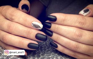 Matte Black Square Acrylic Nails With Design On Ring Finger
