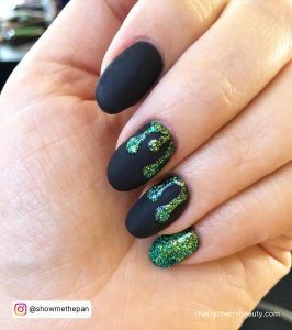 Matte Green And Black Nails With Glitter