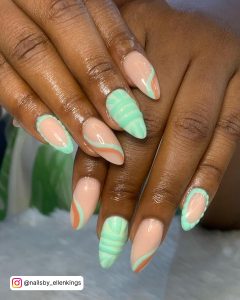 Mint Green And Coral Nails
