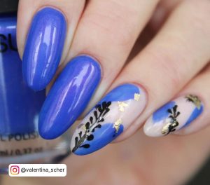 Nail Art In Blue With Stem Design