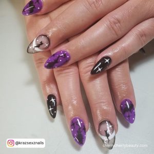Nail Art Purple And Black With Stars