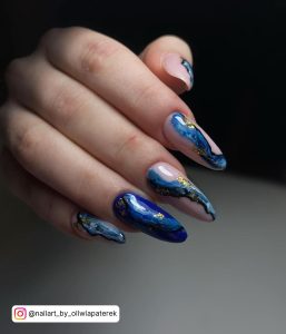 Nail Art With Blue And Black Nail Polish