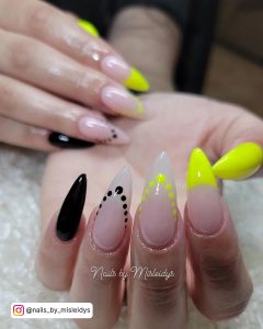 Nail Design Yellow And Black In Stiletto Shape