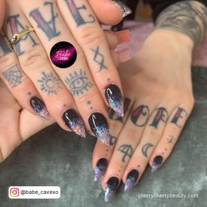 Nails Purple And Black In Stiletto Shape