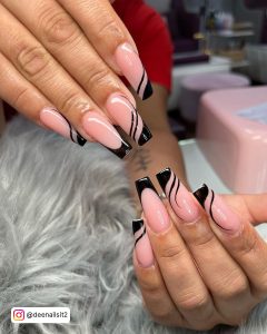 Nails With Black Swirls In Coffin Shape