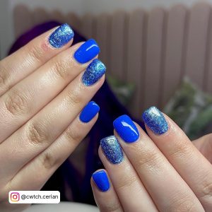 Navy Blue Glitter Ombre Nails