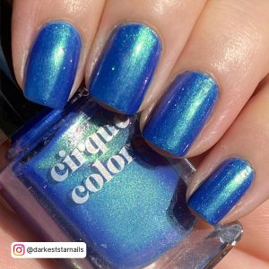 Neon Blue Nails With Glitter