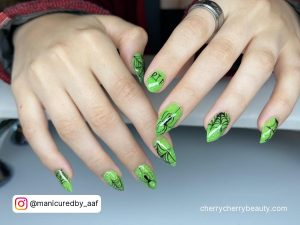 Neon Green And Black Acrylic Nails With Webs