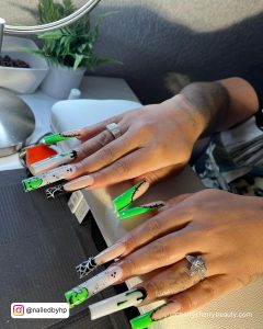 Neon Green And Black Nail Designs With White Combination