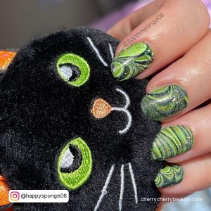 Neon Green And Black Nails With Swirls