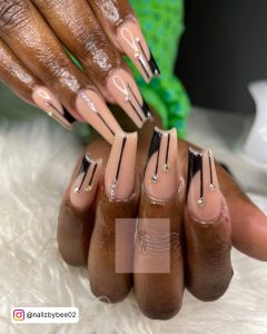 Nude And Black Coffin Nails With Diamonds