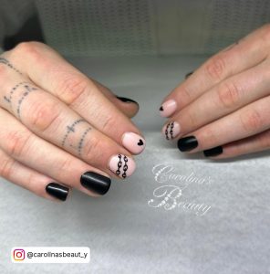 Nude And Black Nails Short With Design On Two Fingers